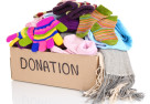 donation box full of fall and winter clothes