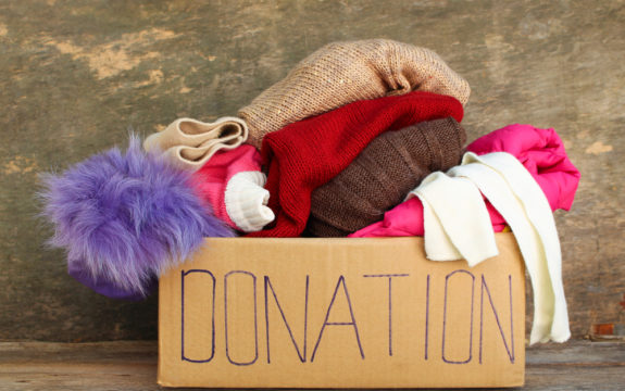 donation box of sweaters